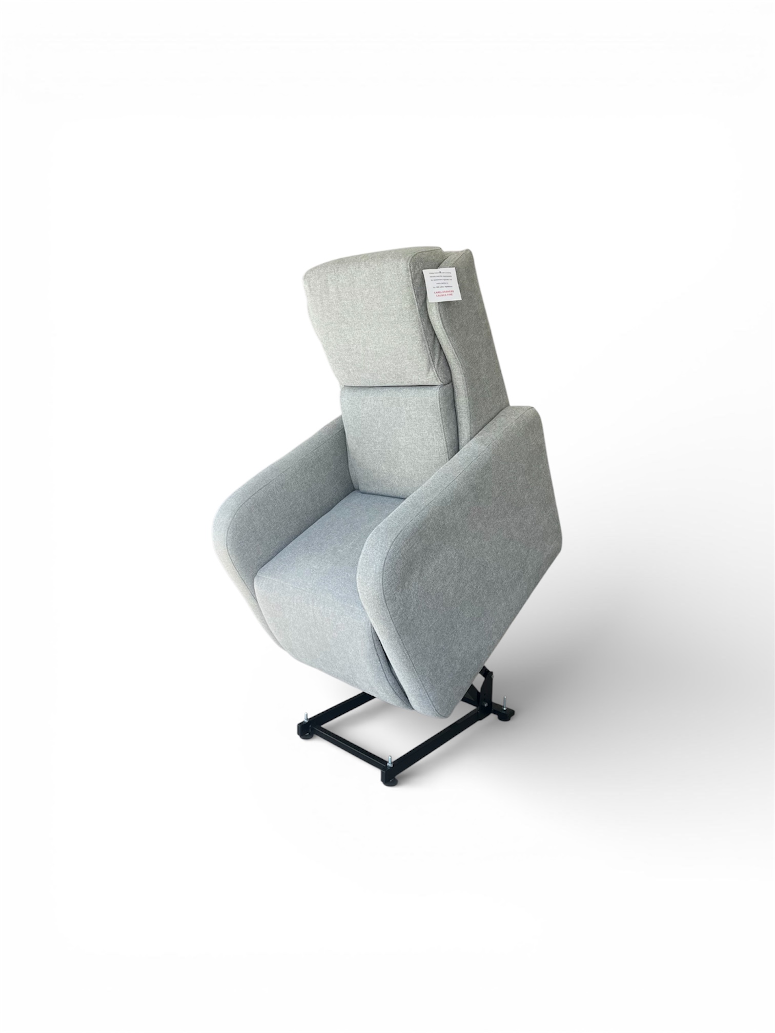 The Buxton chair raised in grey fabric