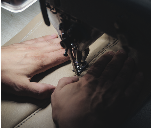 Close-up sewing detail on chair upholstery