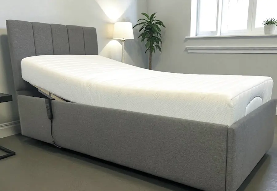 Supportive mattress on an adjustable bed in a bright bedroom