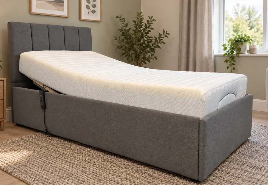 Memory foam mattress on an adjustable bed in a warm, furnished bedroom